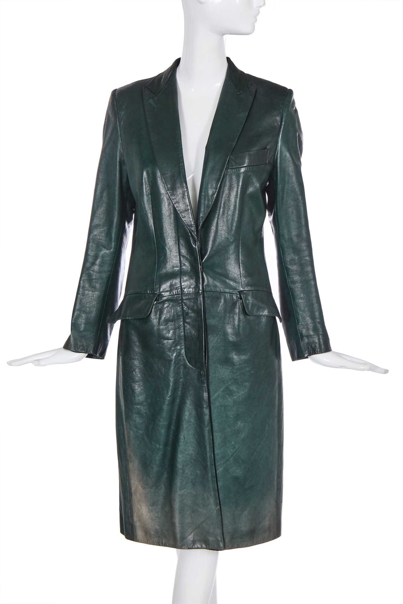 Lot 111 - An Alexander McQueen green leather showpiece ensemble, 'What a Merry Go Round' collection, Autumn-Winter 2001-02