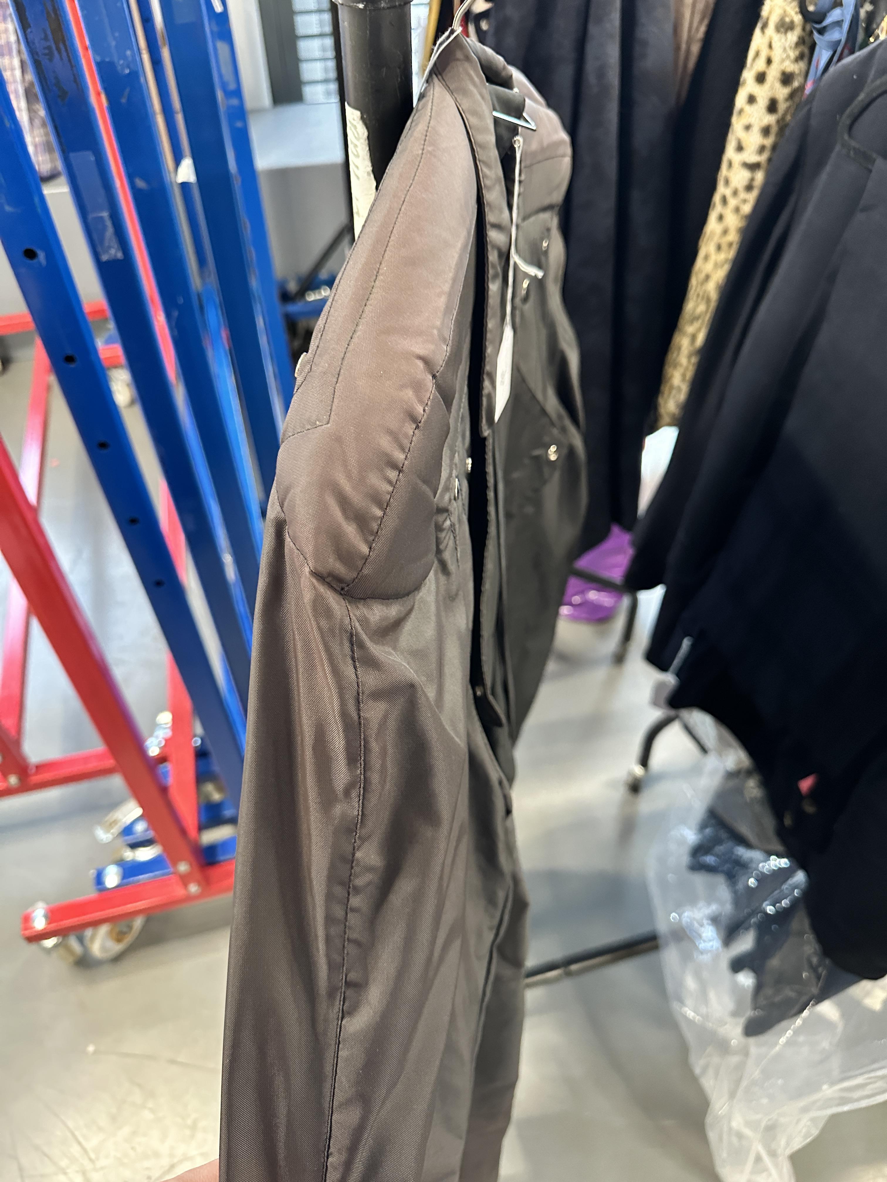 Lot 33 - A Thierry Mugler black polyester raincoat,