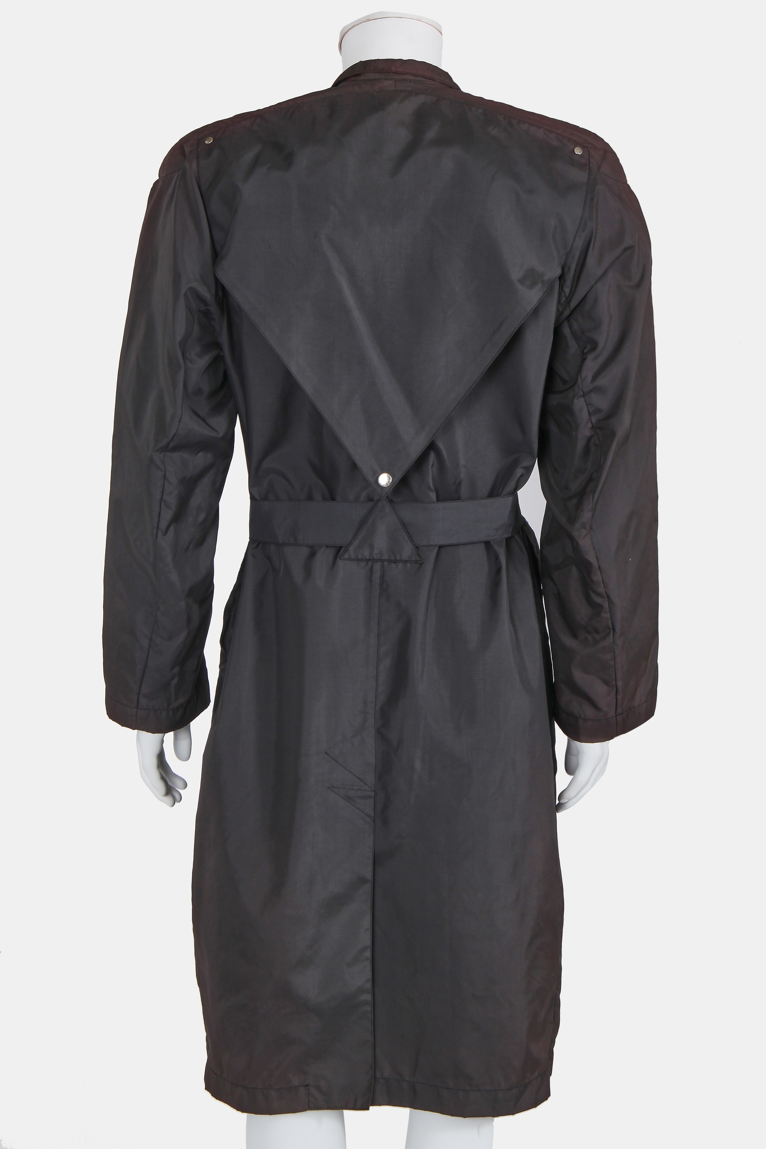 Lot 33 - A Thierry Mugler black polyester raincoat,