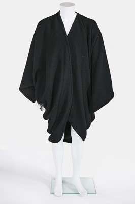 Lot 26 - An Issey Miyake man's black wool 'Transformation' coat, 1976