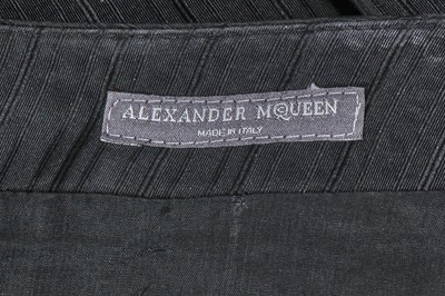 Lot 103 - An Alexander McQueen black silk skirt suit, 'Scanners' collection, Autumn-Winter 2003-04