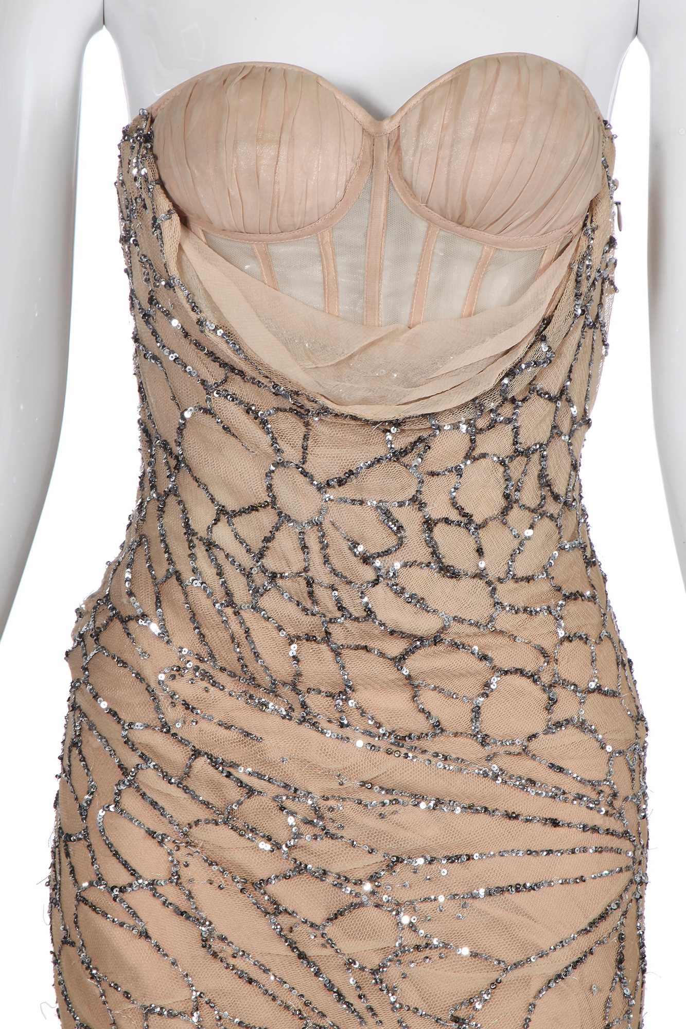 Lot 100 - An Alexander McQueen sequined corset gown, 'Deliverance' commercial collection, Spring-Summer 2004