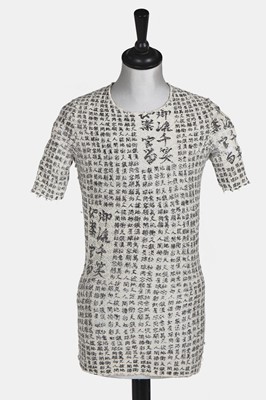 Lot 94 - A rare Jean Paul Gaultier men's jeans ensemble, 'Tattoos/Raw and Refined' collection, Spring-Summer 1994