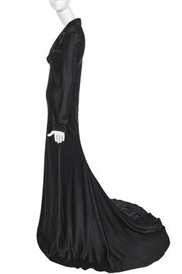 Lot 88 - An Alexander McQueen black satin 'tuxedo' gown, pre-collection Autumn-Winter 2007