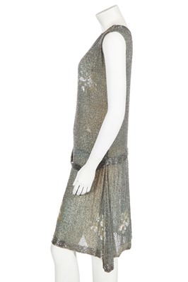 Lot 367 - A beaded green muslin flapper dress circa 1928