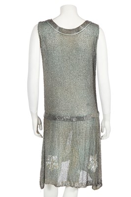 Lot 367 - A beaded green muslin flapper dress circa 1928