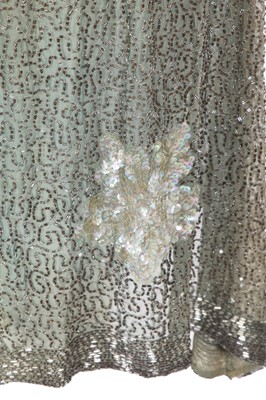 Lot 367 - A beaded green muslin flapper dress circa 1928