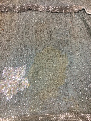 Lot 367 - A beaded green muslin flapper dress circa 1928