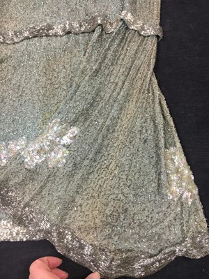 Lot 367 - A beaded green muslin flapper dress circa 1928