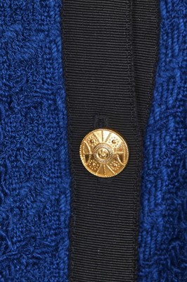 Lot 1 - A Chanel blue and black bouclé tweed jacket, 1989