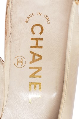 Lot 10 - A pair of Chanel shoes and a Chanel hat, late 1980s-early 1990s