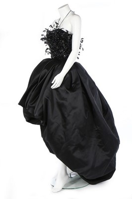 Lot 443 - A Nina Ricci couture black satin ballgown,...