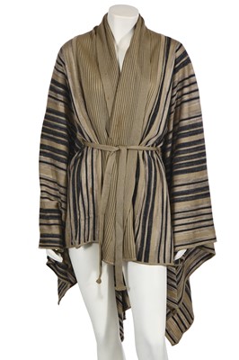 Lot 122 - A rare and early Issey Miyake knit poncho, circa 1975