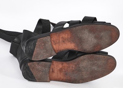 Lot 36 - A pair of Jean Paul Gaultier men's black leather sandals, circa 1985