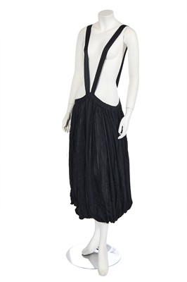 Lot 118 - An early Comme des Garçons black pinafore skirt, 1985-86