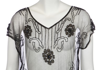 Lot 381 - A group of beaded garments and accessories, 1918-1928