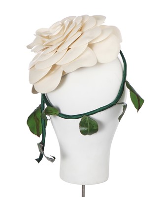 Lot 321 - A fine Christian Dior white camellia blossom hat, 1955-60