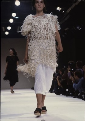 Lot 35 - An important early Comme des Garçons black tousled knit tunic, Spring-Summer 1984