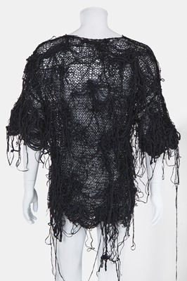 Lot 35 - An important early Comme des Garçons black tousled knit tunic, Spring-Summer 1984