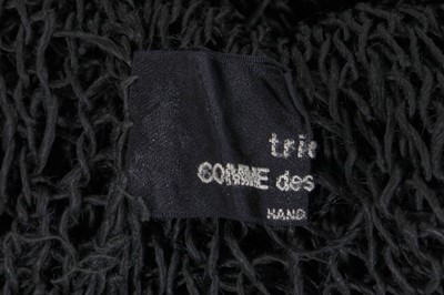 Lot 35 - An important early Comme des Garçons black tousled knit tunic, Spring-Summer 1984