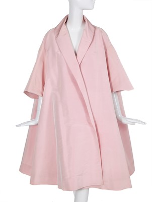 Lot 450 - A Pierre Balmain haute couture baby pink faille tent-coat, circa 1958