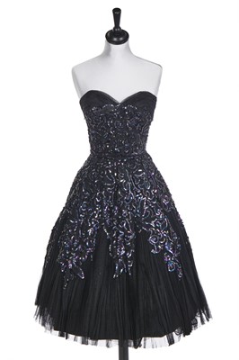 Lot 452 - A Pierre Balmain haute couture black sequined evening dress, circa 1955