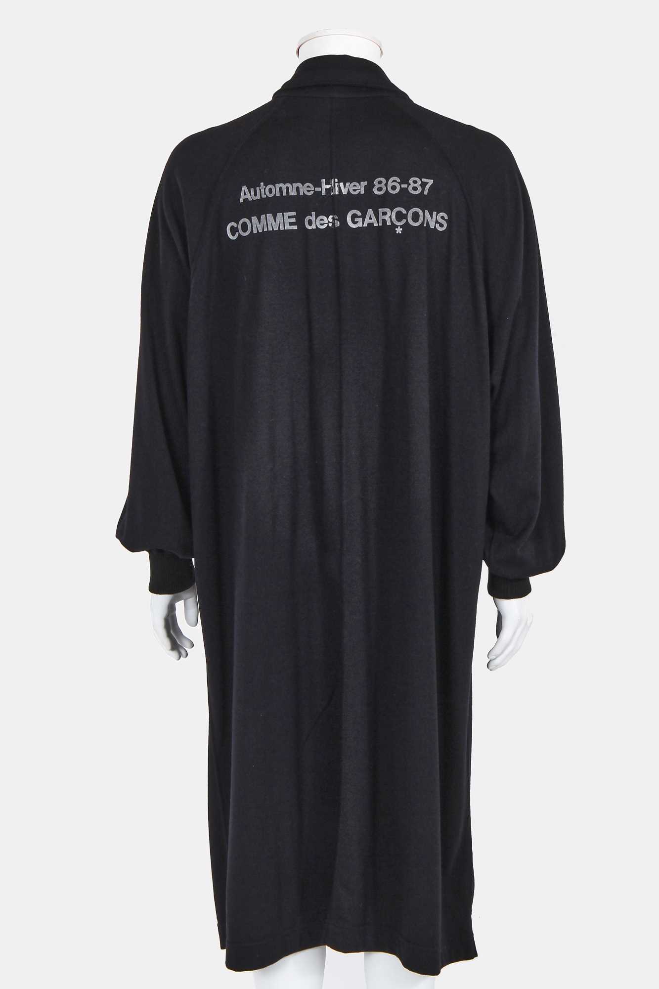 Click for high resolution Lot 44 - A Comme des Garçons black jersey 'Staff' coat, Autumn-Winter 1986-87