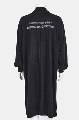 Lot 44 - A Comme des Garçons black jersey 'Staff' coat, Autumn-Winter 1986-87