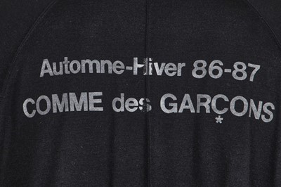 Lot 44 - A Comme des Garçons black jersey 'Staff' coat, Autumn-Winter 1986-87