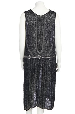 Lot 369 - A black beaded flapper dress, circa 1928