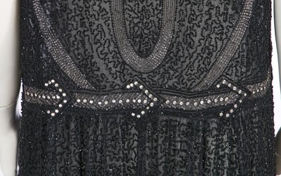Lot 369 - A black beaded flapper dress, circa 1928
