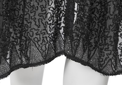 Lot 369 - A black beaded flapper dress, circa 1928