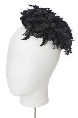 Lot 323 - A Christian Dior black silk hat, 1950s