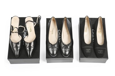 Lot 4 - Three pairs of Chanel shoes, modern, stamped...