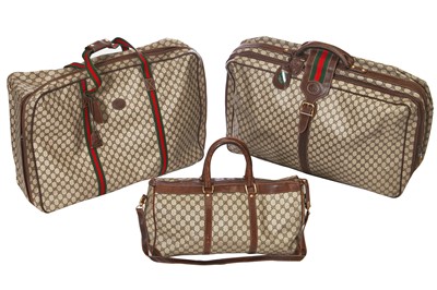 Lot 23 - A group of Gucci suitcases, 1970s - 1980s