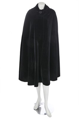 Lot 248 - A Christian Dior London black velvet evening cloak, circa 1970