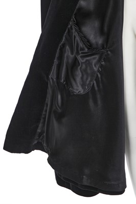 Lot 248 - A Christian Dior London black velvet evening cloak, circa 1970