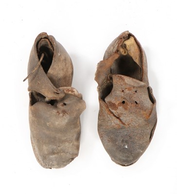 Lot 474 - A pair of brown leather child's shoes,...