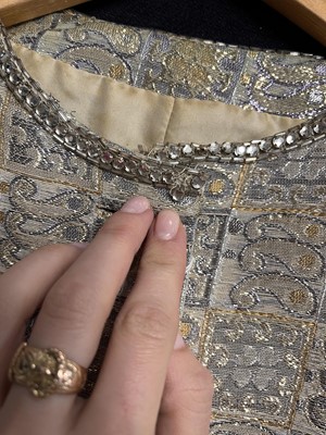 Lot 403 - A Christian Dior Iran by Marc Bohan gold and silver lamé evening coat, late 1960s-early 1970s