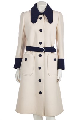 Lot 293 - An André Courrèges navy and cream coat, early 1970s