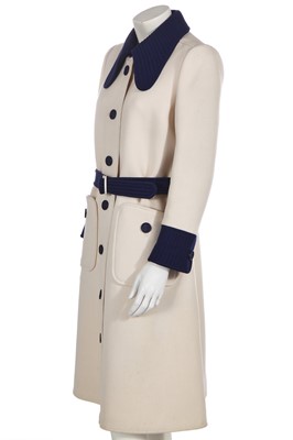Lot 293 - An André Courrèges navy and cream coat, early 1970s