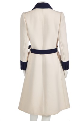 Lot 293 - An André Courrèges navy and cream coat, early 1970s