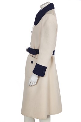 Lot 293 - An André Courrèges navy and cream coat, early 1970s