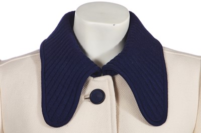 Lot 293 - An André Courrèges navy and cream coat, early 1970s