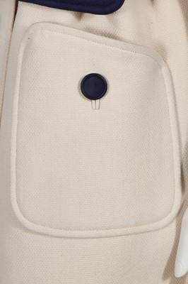 Lot 293 - An André Courrèges navy and cream coat, early 1970s
