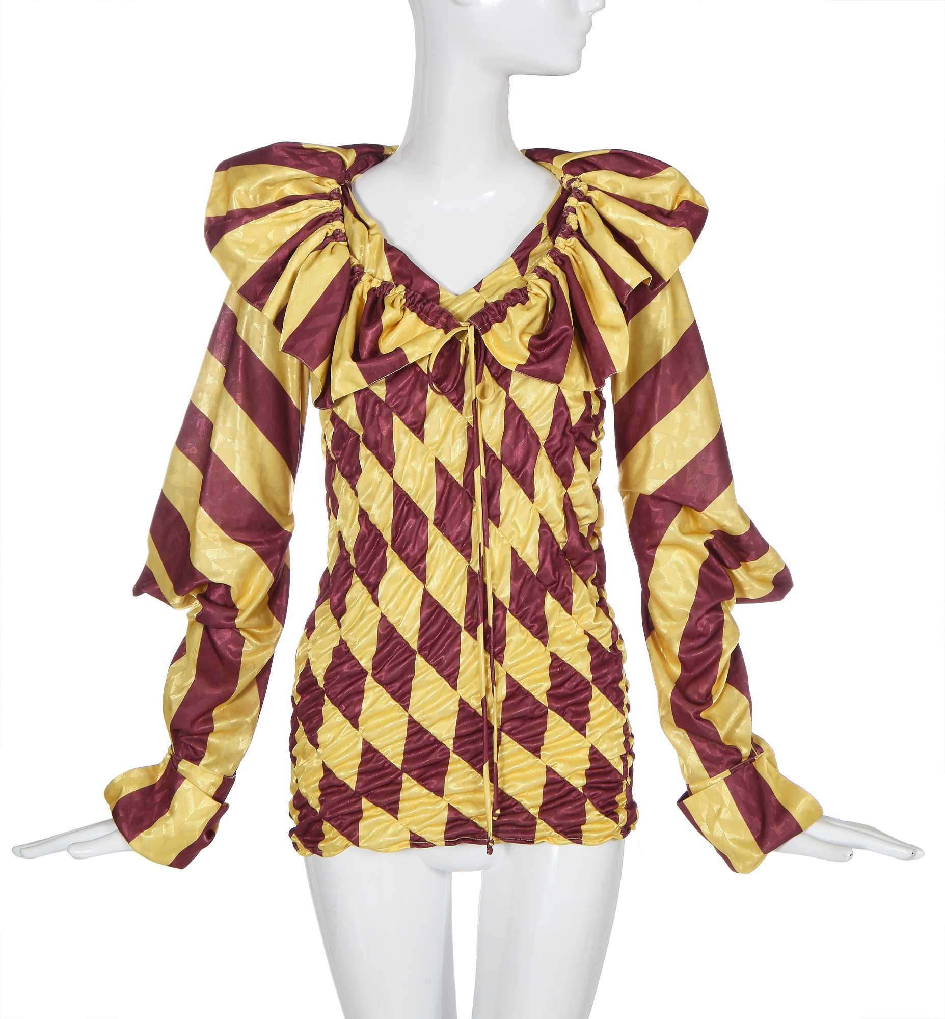 Lot 196 - A John Galliano burgundy and yellow blouse,