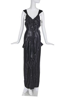 Lot 462 - A Norman Hartnell black ciré satin evening gown, circa 1930
