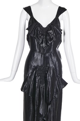 Lot 462 - A Norman Hartnell black ciré satin evening gown, circa 1930