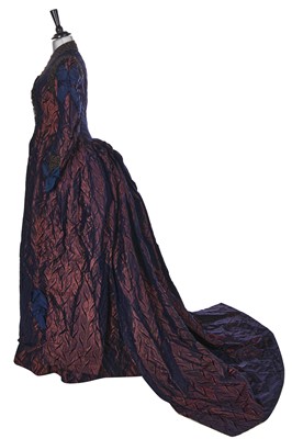 Lot 420 - A beaded aubergine silk gown, circa 1880