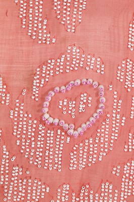 Lot 368 - A beaded pink muslin flapper dress, circa 1925